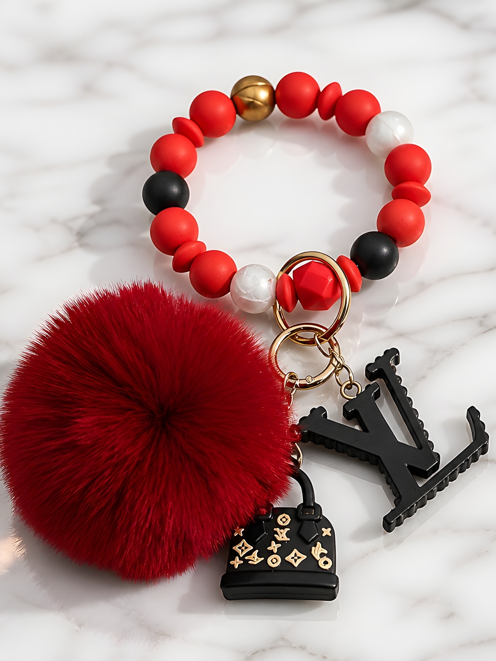 LV Wristlette. Detachable Emblem, Purse, Pom Pom And Stretchable Wristlette - Picture 1 of 8